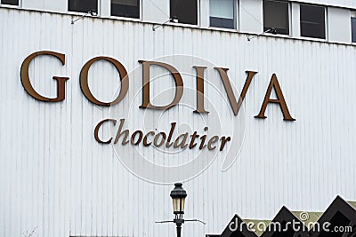 Koekelberg, Brussels Capital Region, Belgium - Facade and sign of the Godiva Chocolatier chocolate factory Editorial Stock Photo
