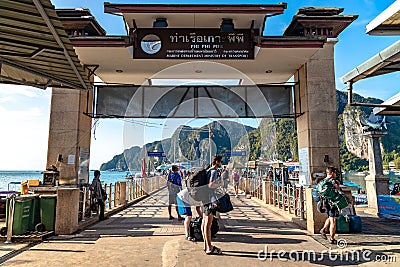 Koh Phi Phi island, Krabi Thailand - November 26 2019: Busy, crowded Tonsai Pier on a paradise Thai island. Lots of people coming Editorial Stock Photo
