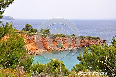 Kokinokastro red cliffs beach landscape Stock Photo