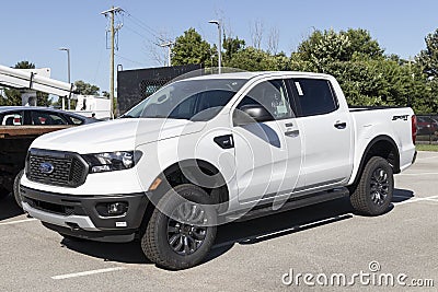 Ford Ranger pickup truck display. The Ranger nameplate has been used on multiple light duty trucks models sold by Ford Editorial Stock Photo