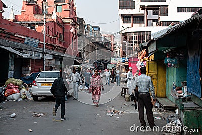 Kolkata, India - February 2, 2020: Everyday life on the street where unidentified people walks by on February 2, 2020 in Kolkata Editorial Stock Photo
