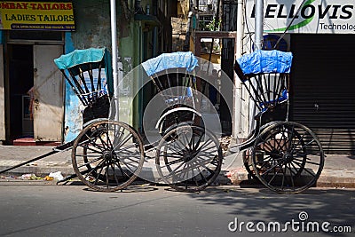 Three empty rickshaw carts on street Editorial Stock Photo