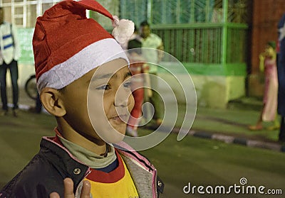 A sweet little boy dress in santa clown on christmas Editorial Stock Photo