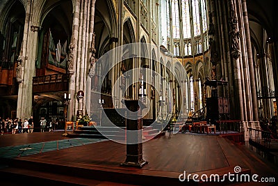 Kolner Dom, Cologne Cathedral Interior, Stained Glass Windows, Roman Catholic gothic church, Details of the sculptures, Nave altar Editorial Stock Photo