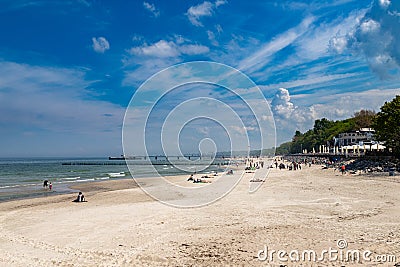 Kolobrzeg, zachodniopomorskie / Poland - May, 21, 2019: Pier in a holiday resort by the sea. A place of rest in Central Europe Editorial Stock Photo