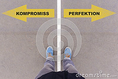 Kompromiss / Perfektion ,German text for compromise or perfection on asphalt ground, feet and shoes on floor Stock Photo