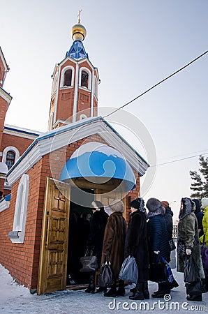 People came for the blessed water in Cathedral of the Kazan Icon Editorial Stock Photo