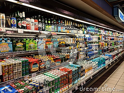 Beer, water, and Liquor for sale Inside ABC Store Editorial Stock Photo