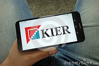 Man holding smartphone with Kier Group plc logo Editorial Stock Photo