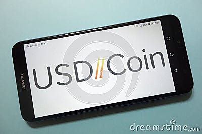 USD Coin USDC cryptocurrency logo displayed on smartphone Editorial Stock Photo