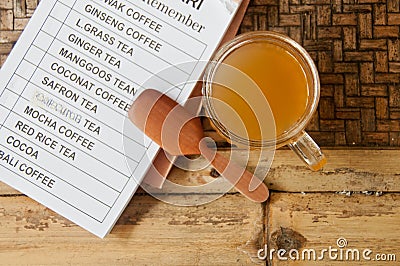 Kopi Luwak Bali famous organic Palm Civet coffee with wooden spoon and menu Stock Photo