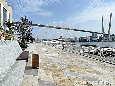 Vladivostok, Russia, September, 09, 2023. Korabelnaya Embankment, Golden Bridge, Grand Hotel and SPA Editorial Stock Photo