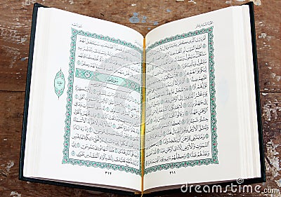 Koran holy book with rosary Stock Photo