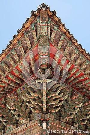 Korea buddhist temple traditional old roof painting close up Stock Photo