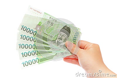 Korea money won and hand Stock Photo