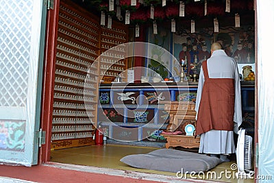 A Korean-Buddhist monk practising worship in one room. Pic was t Editorial Stock Photo
