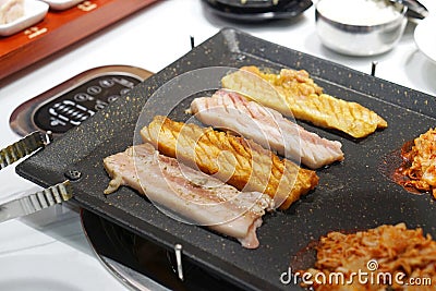 Korean grilled pork belly BBQ Samgyeopsal Gui - The popular Korean barbecue dish. Stock Photo