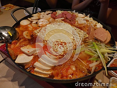 Korean hotpot budae jijae with melted cheese Stock Photo