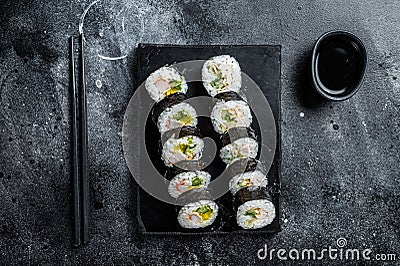 Korean rice roll Kimbap or gimbap, Korean sushi. Black background. Top view Stock Photo