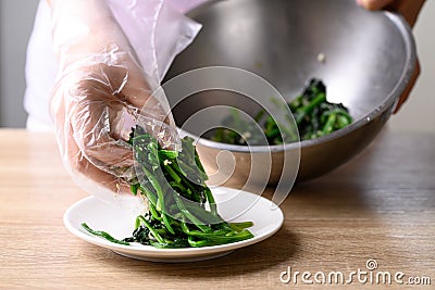 Korean spinach salad (Sigeumchi namul) Stock Photo