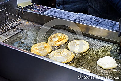 Korean sweet pancakes of a street vendor at anyang central market, South Korea Editorial Stock Photo