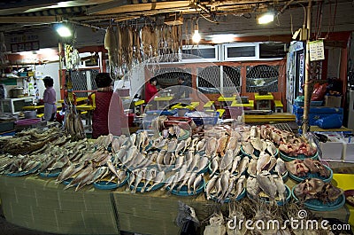 Korean women working at fish market Editorial Stock Photo