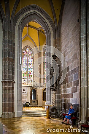 Kosice, Slovakia. Woman inside St. Elisabeth cathedral Editorial Stock Photo