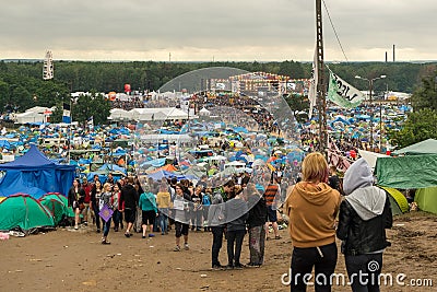Kostrzyn nad OdrÄ…, Poland - July 15, 2016: tents, people and the main stage at the Przystanek Woodstock music festival PolAndRock Editorial Stock Photo