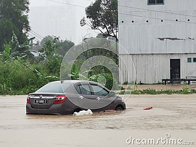 Outdoor scenery during raining season with flash flood at Menggatal Road. Editorial Stock Photo