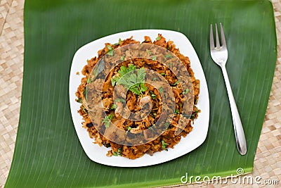 Kothu Parotta a popular South Indian street food in Kerala made with shredded Porotta Stock Photo