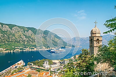 Kotor bay with medieval church and old town from Lovcen Mountain, Montenegro. Adriatic fjord with boats and cruise ship Stock Photo