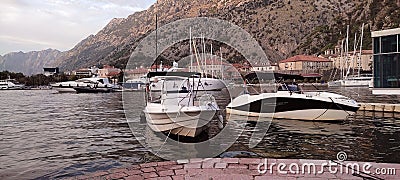 Kotor, Montenegro boats and old town view Editorial Stock Photo