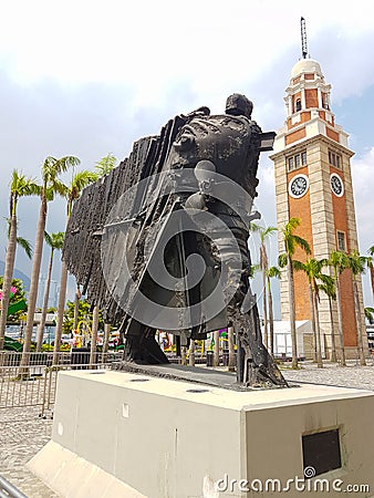 Mobile phone image of scrap metal sculture in front of historic Editorial Stock Photo