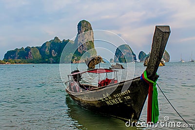 Krabi Ao Nang, Railay beach longtail boats on sand in Thailand Editorial Stock Photo