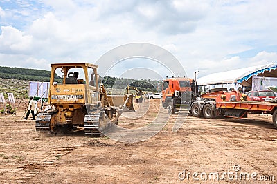 Truck and Heavy equipment by Agricultural Land Reform Office prepare to build infrastructure Editorial Stock Photo