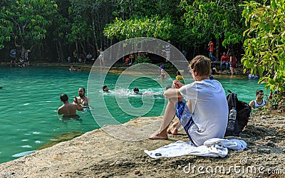 Emerald crystal blue water pool in Thailand, citizens and tourists swiming Editorial Stock Photo