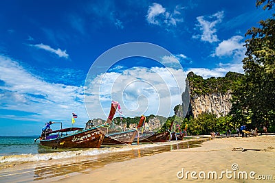 Krabi, Thailand - NOVEMBER 23, 2019: Amazing view of beautiful beach with longtale boats. Location: Railay beach, Krabi, Thailand Editorial Stock Photo