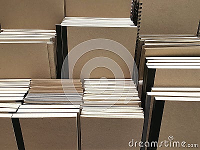 Kraft Paper Cover Notebooks on shelf background Stock Photo