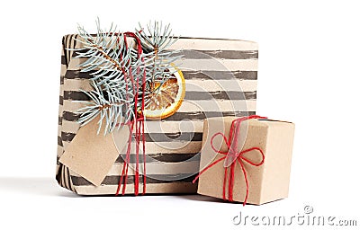 Kraft stylish christmas gift boxes isolated on white Stock Photo