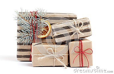 Kraft stylish christmas gift boxes isolated on white Stock Photo