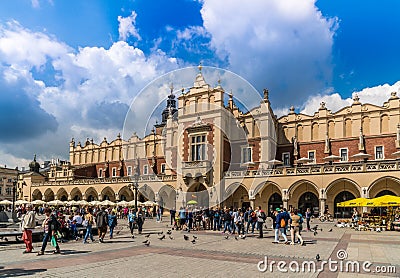 Krakau August 21th 2017: Tourists entering and leaving the hist Editorial Stock Photo