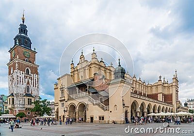 Krakau August 21th 2017: Tourists entering and leaving the hist Editorial Stock Photo