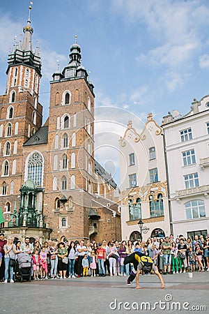 Krakow cloth hall and Saint Mary's Basilica on the main market square at sunrise in Cracow, Poland. Morning scene in Editorial Stock Photo