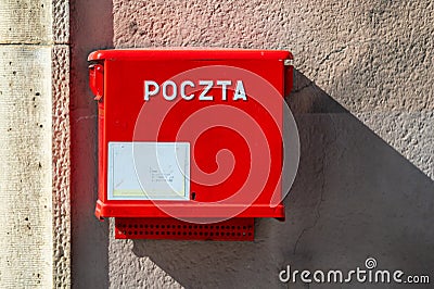 Krakow, Lesser Poland - A Poczta or postal letter box in red Editorial Stock Photo