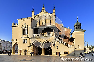 Krakow, Lesser Poland / Poland - 2017/03/28: Cracow Old Town, Cloth Hall and medieval tenements by Main Market Square Editorial Stock Photo