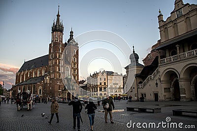 10.05.2015 Krakow Poland - Church St. Mary and Cloth Hall main Market Square city Editorial Stock Photo