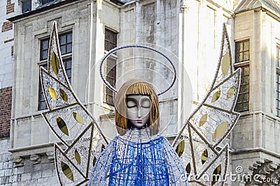 KRAKOW, POLAND - DECEMBER 05, 2019: Outdoor angel-shaped Christmas decoration with glowing wings Editorial Stock Photo