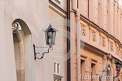 Vintage ornamental lamp on Cloth Hall Sukiennice in Krakow, Poland Editorial Stock Photo