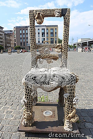 KRAKOW, POLAND, JUL 3: Chair in the Plac Bohaterow Getta in Jewish Plaza in Krakow, Poland on July 3, 2017. This area is Editorial Stock Photo