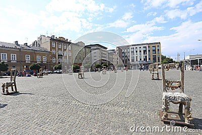 KRAKOW, POLAND, JUL 3: Chairs in the Plac Bohaterow Getta in Editorial Stock Photo